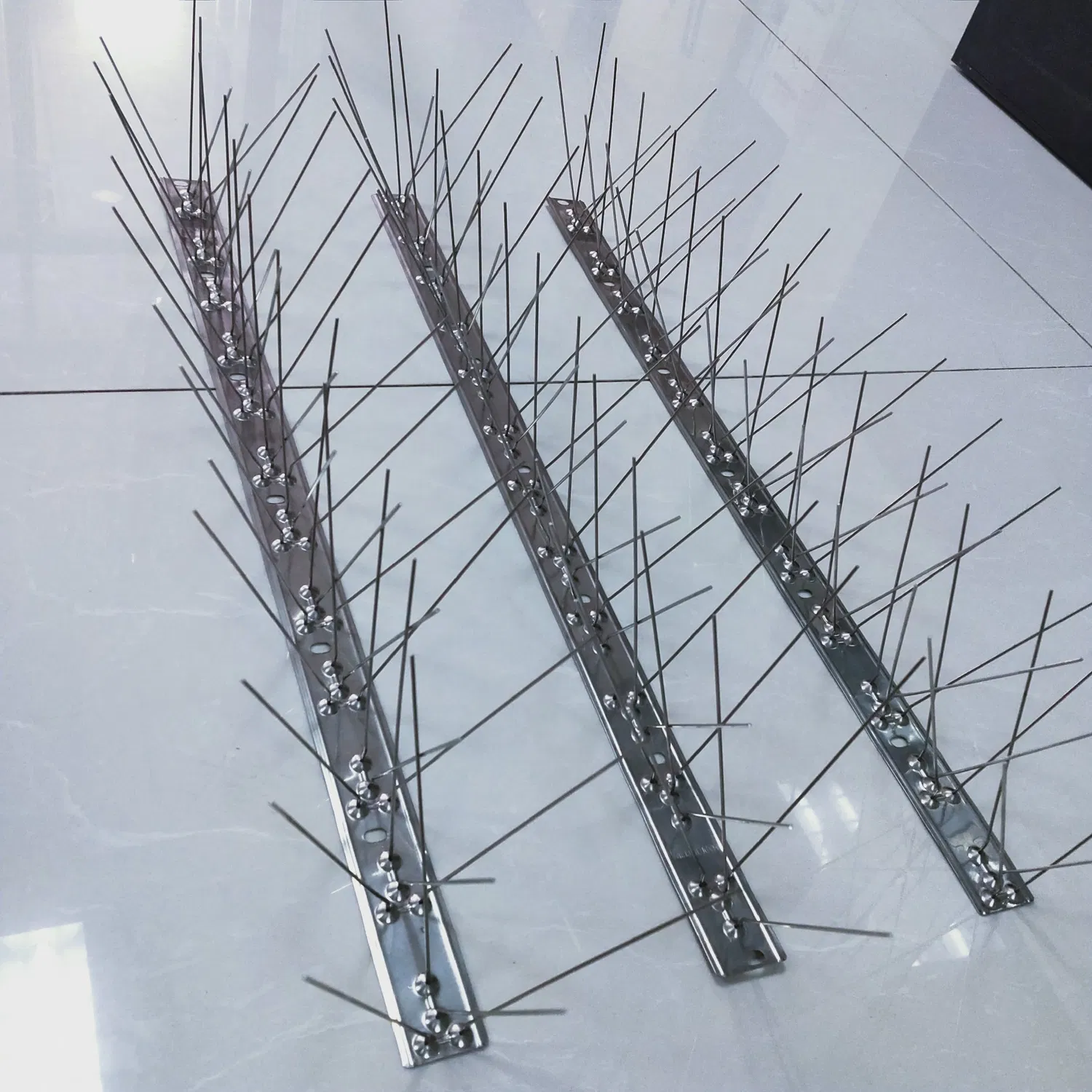 Stainless steel anti-pigeon spike strips for roof edges